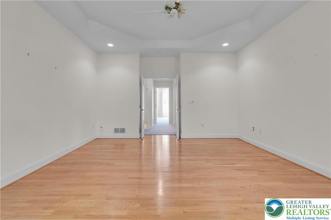 268 Jefferson Place Bethlehem, PA 18020 - Photo 21 of 49 a view of an empty room with wooden floor and a window