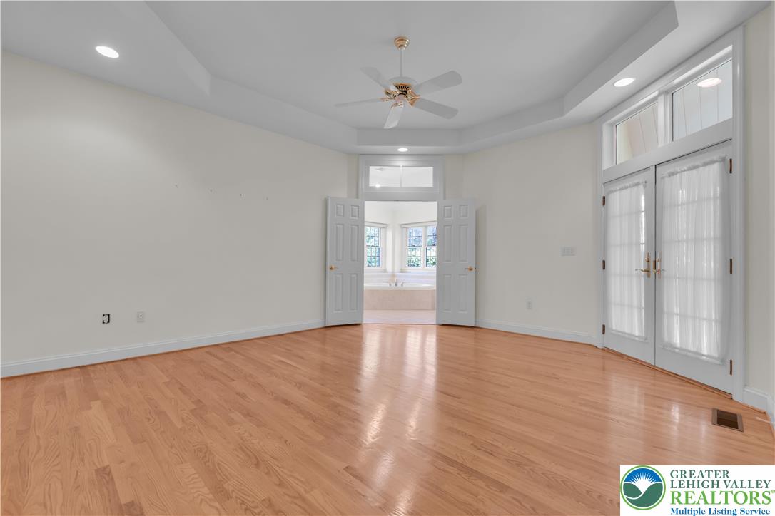 268 Jefferson Place Bethlehem, PA 18020 - Photo 23 of 49 a view of an empty room with window and wooden floor