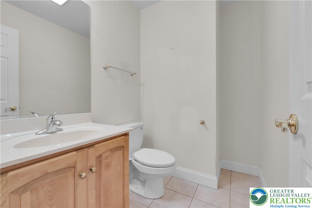 268 Jefferson Place Bethlehem, PA 18020 - Photo 33 of 49 a bathroom with a sink a toilet and a mirror