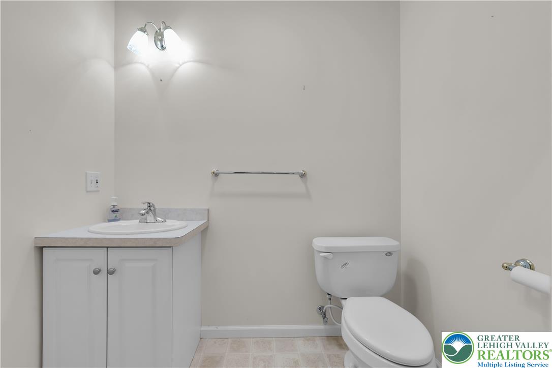 268 Jefferson Place Bethlehem, PA 18020 - Photo 36 of 49 a bathroom with a toilet a sink and mirror