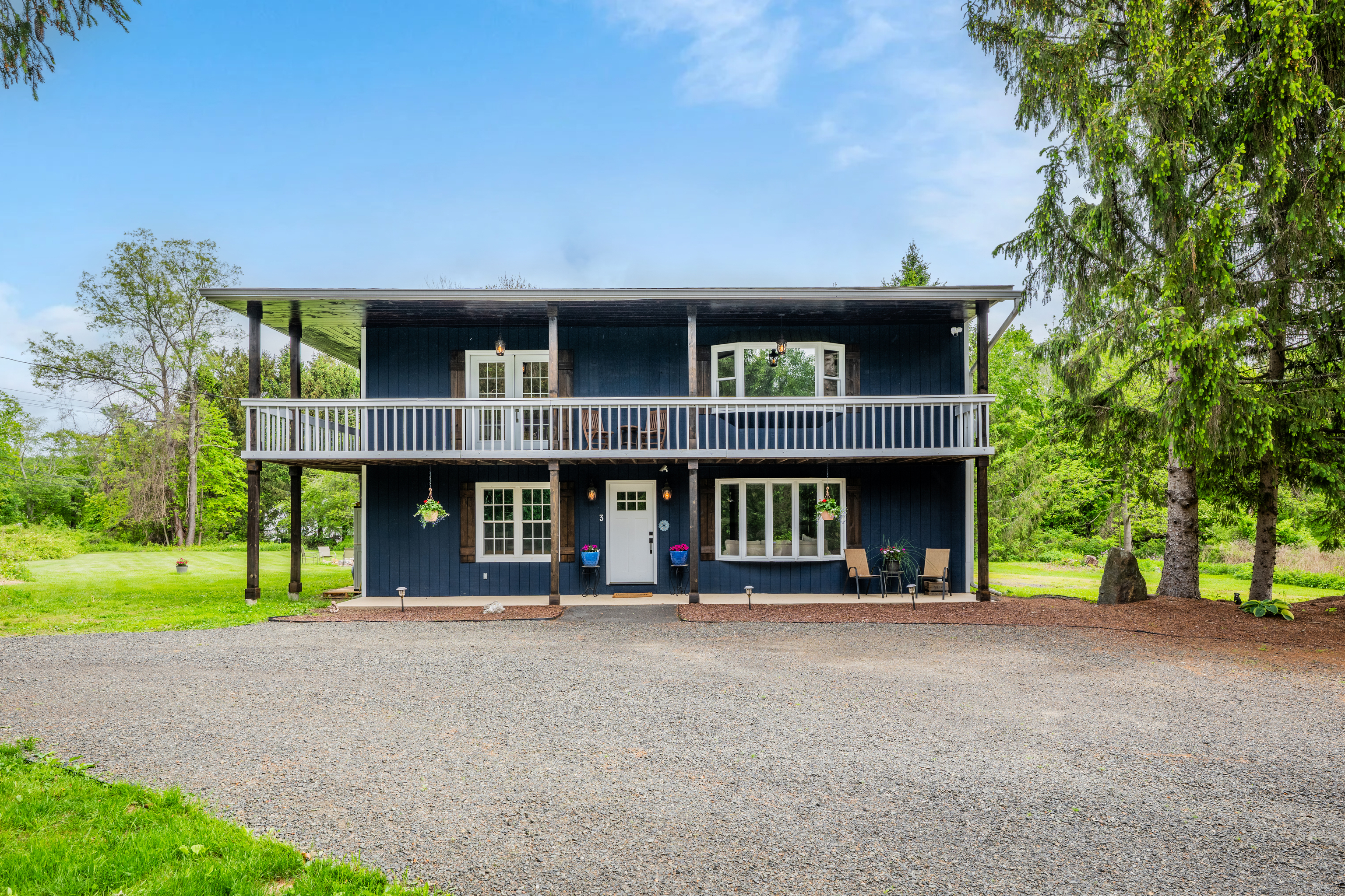 front view of a house with a street