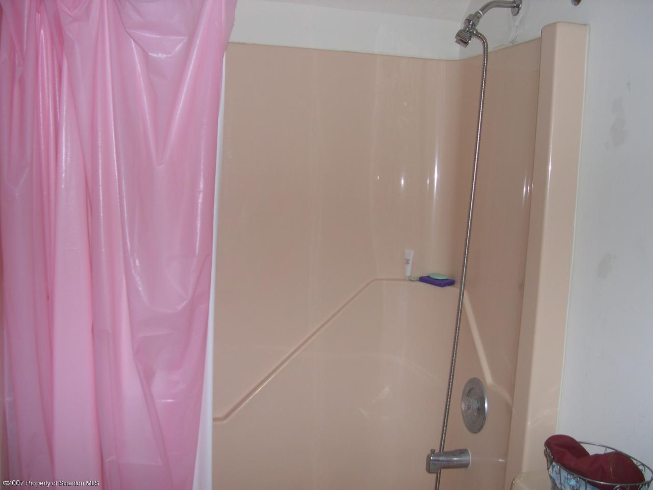 2400 Crest View Road Lake Ariel, PA 18436 - Photo 5 of 9 a bathroom with a shower curtain