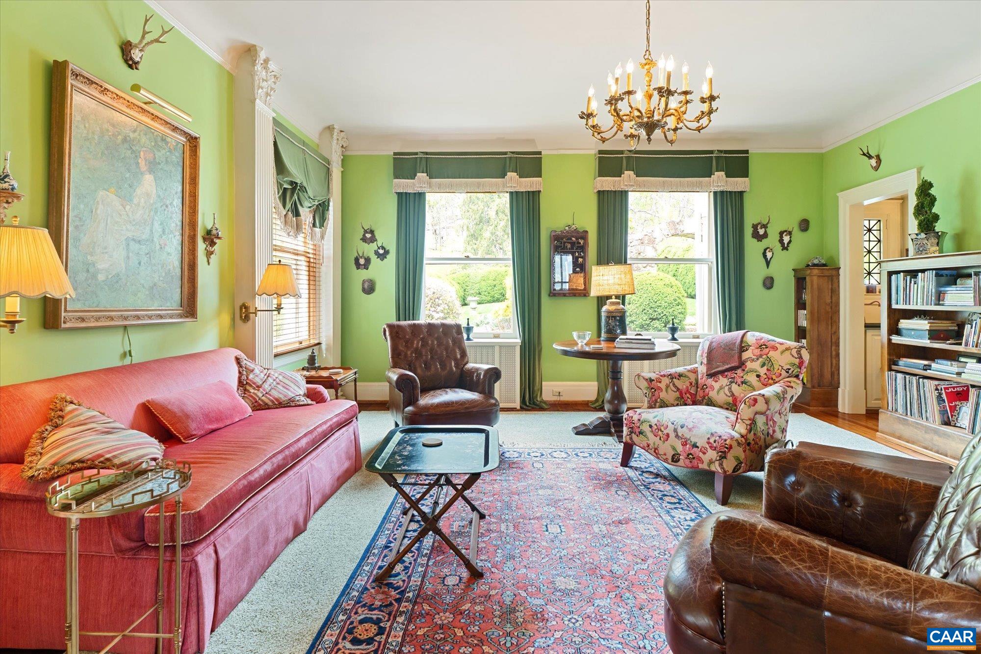 356 Routier Hill Road Hot Springs, VA 24445 - Photo 19 of 75 a living room with furniture and a chandelier