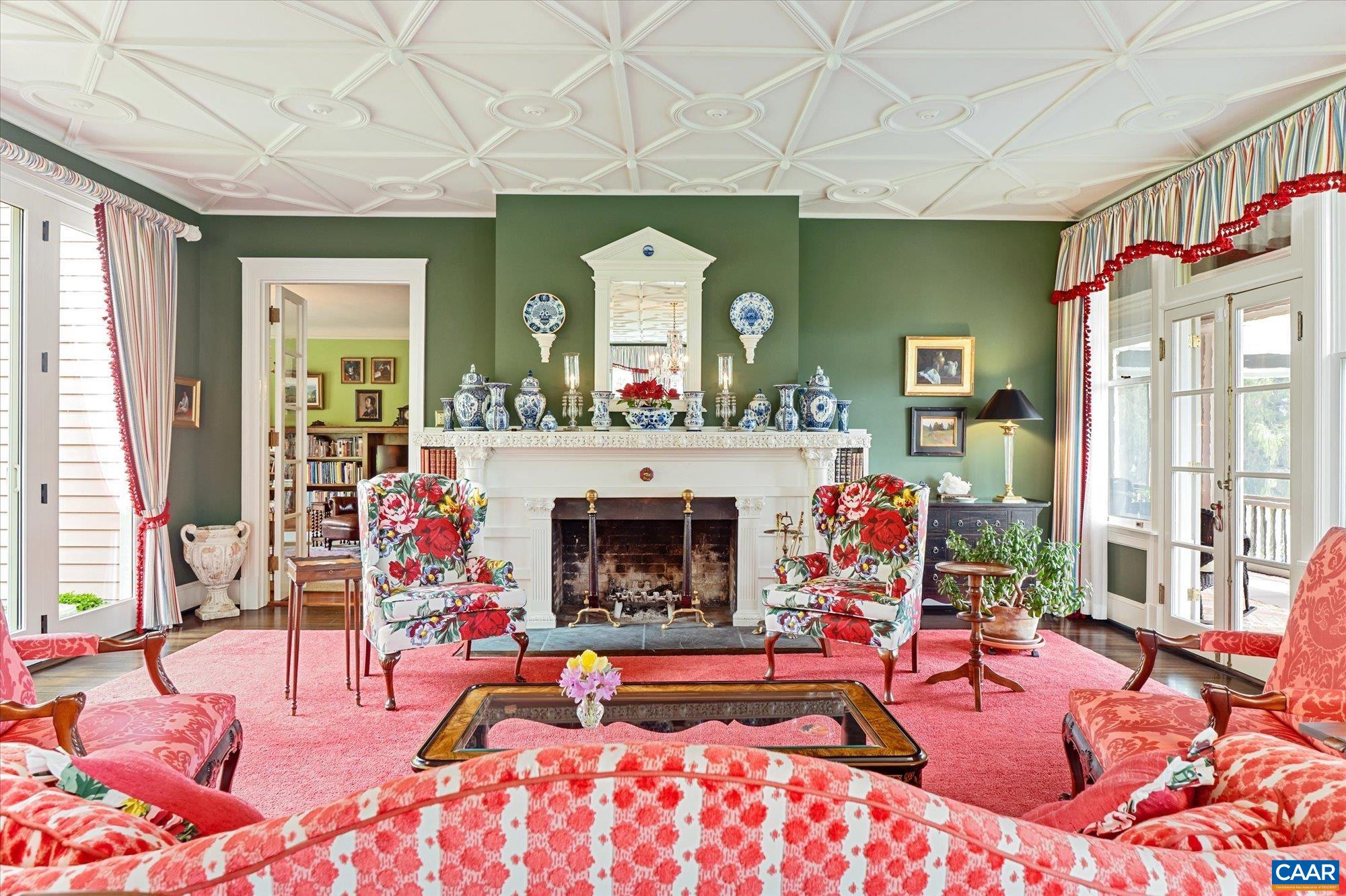 356 Routier Hill Road Hot Springs, VA 24445 - Photo 21 of 75 a living room with furniture fireplace and a large window