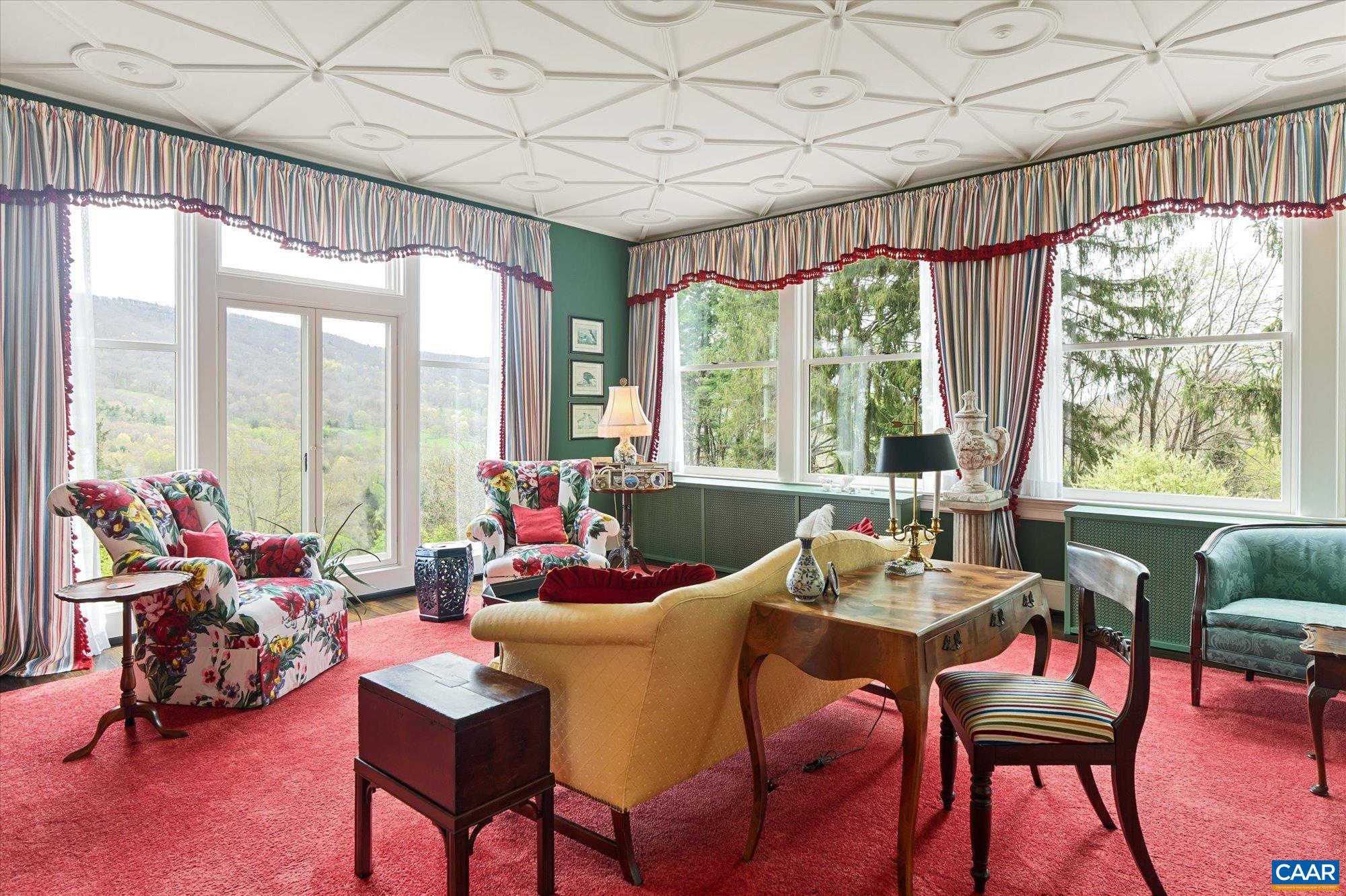 356 Routier Hill Road Hot Springs, VA 24445 - Photo 26 of 75 a living room with furniture and a large window