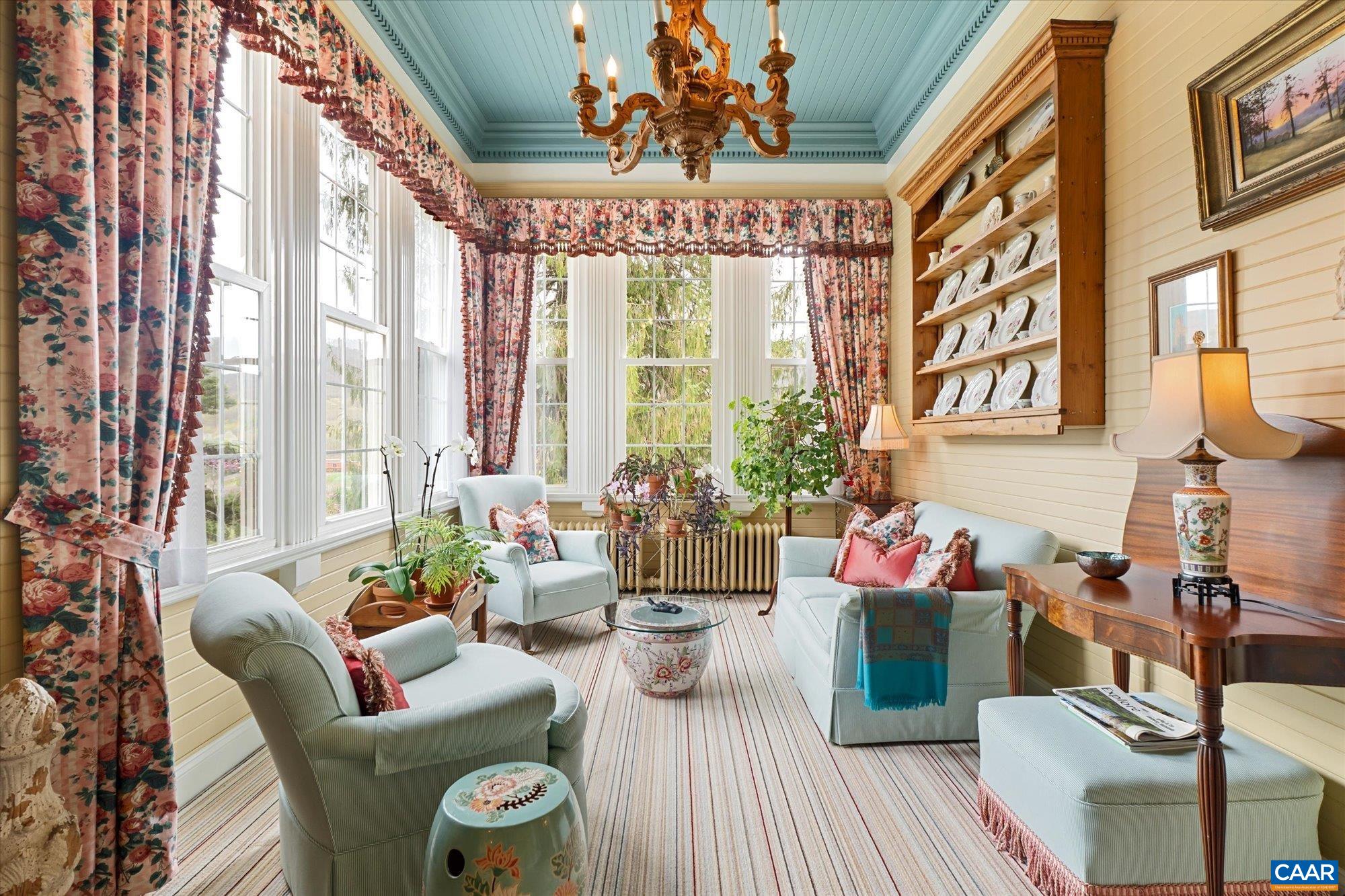 356 Routier Hill Road Hot Springs, VA 24445 - Photo 34 of 75 a living room with furniture and a large window