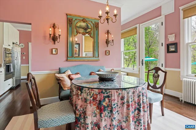 a bathroom with a double vanity sink mirror and toilet