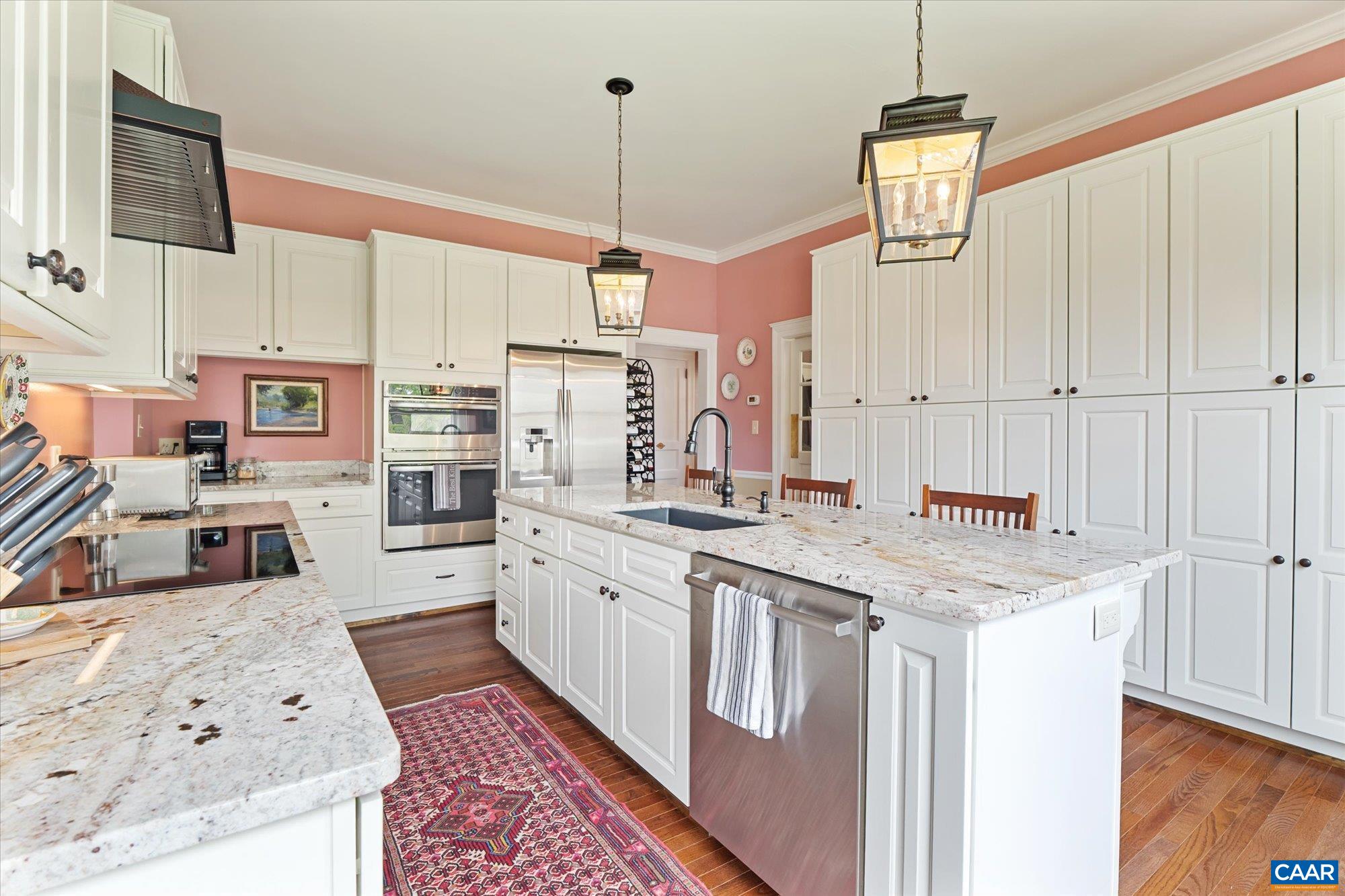 356 Routier Hill Road Hot Springs, VA 24445 - Photo 36 of 75 a kitchen with stainless steel appliances granite countertop a sink a stove and a refrigerator