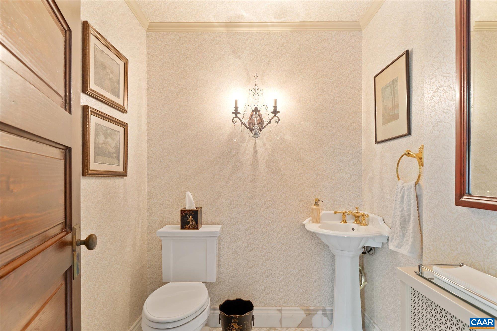 356 Routier Hill Road Hot Springs, VA 24445 - Photo 41 of 75 a bathroom with a sink toilet and a mirror