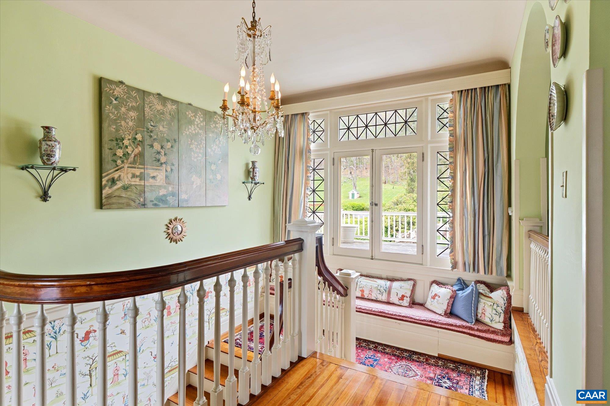 356 Routier Hill Road Hot Springs, VA 24445 - Photo 45 of 75 a living room with furniture and a chandelier