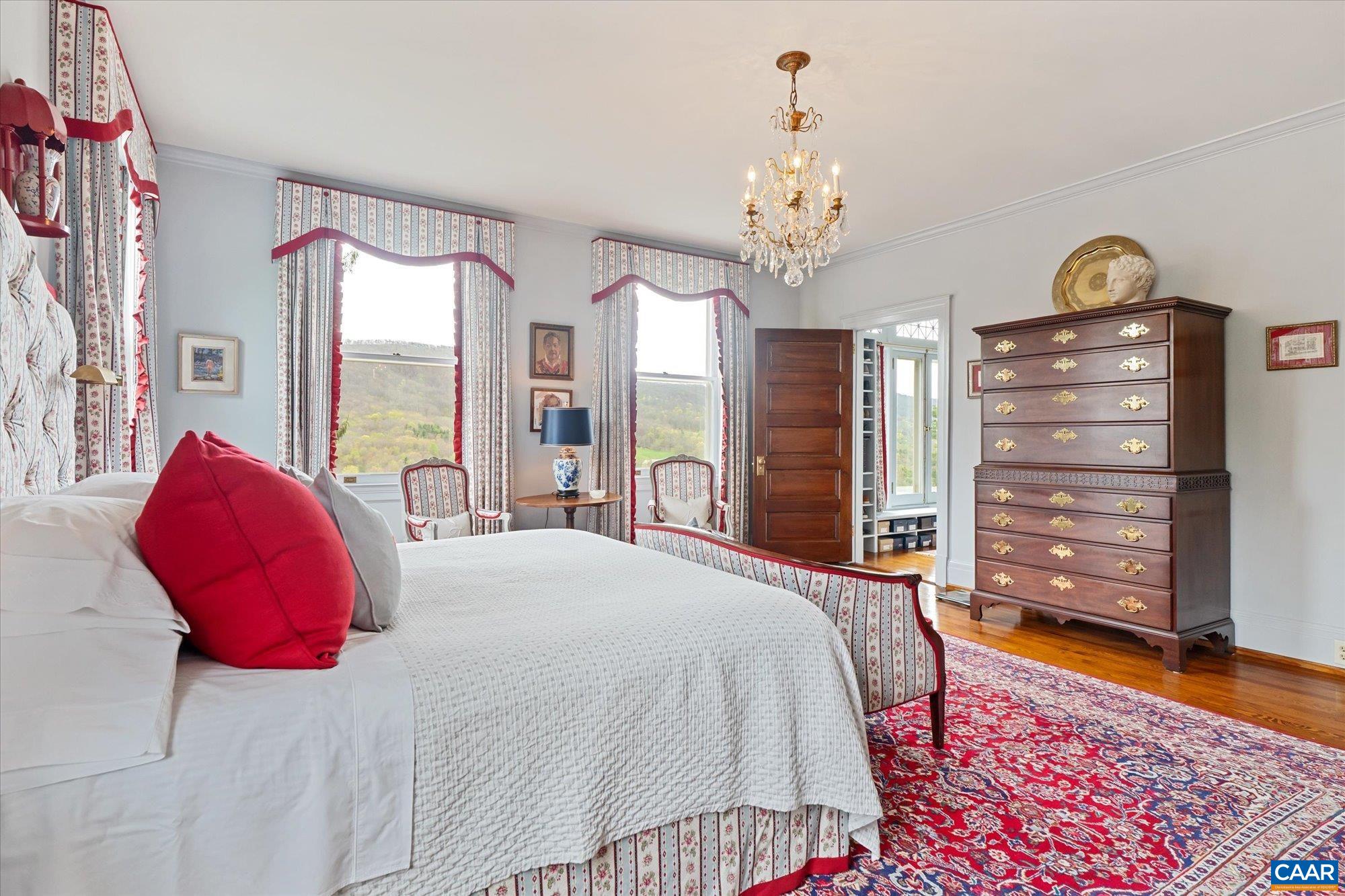 356 Routier Hill Road Hot Springs, VA 24445 - Photo 46 of 75 a bedroom with a bed dresser and a window