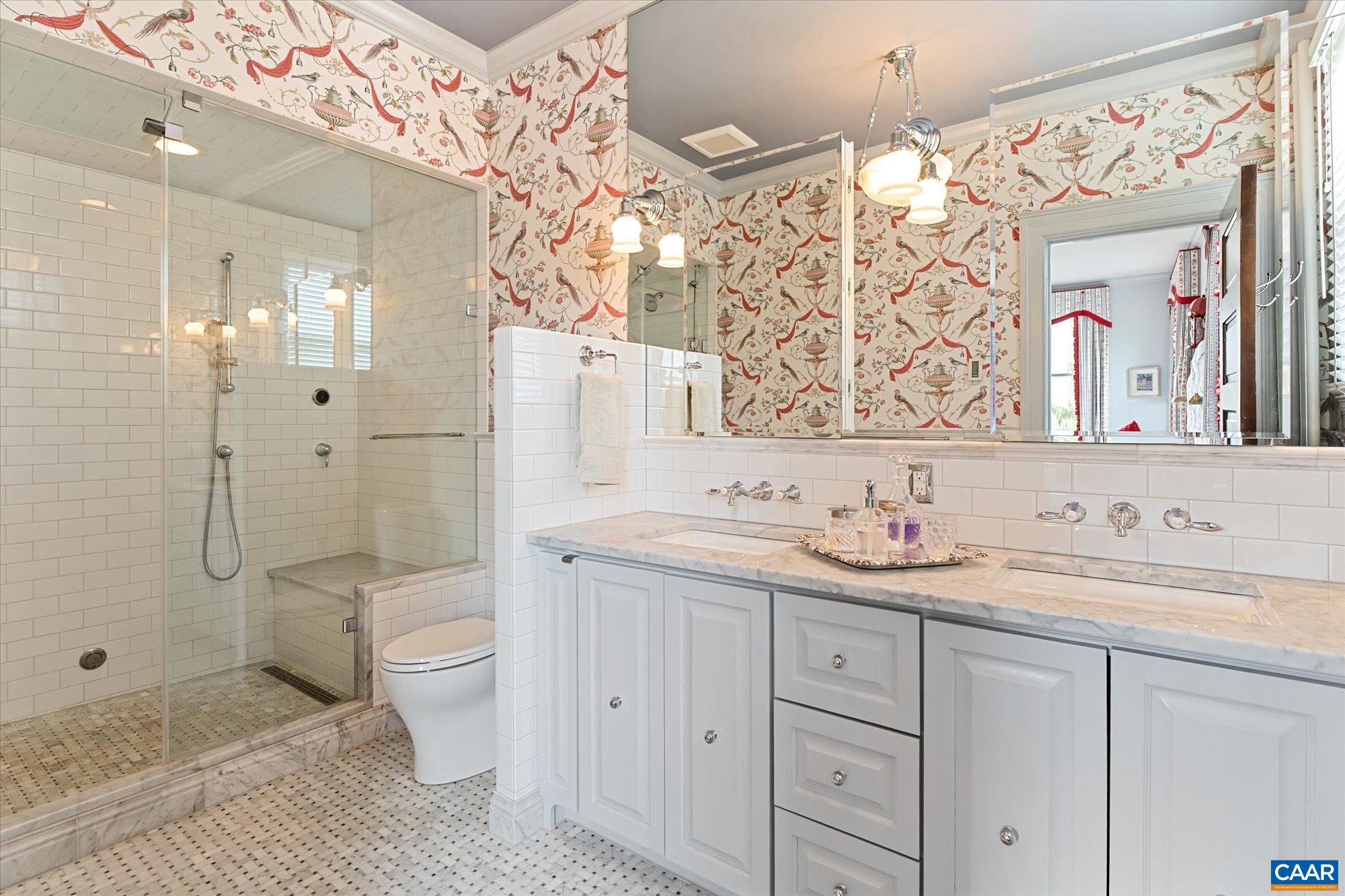 356 Routier Hill Road Hot Springs, VA 24445 - Photo 49 of 75 a bathroom with a double vanity sink mirror and toilet
