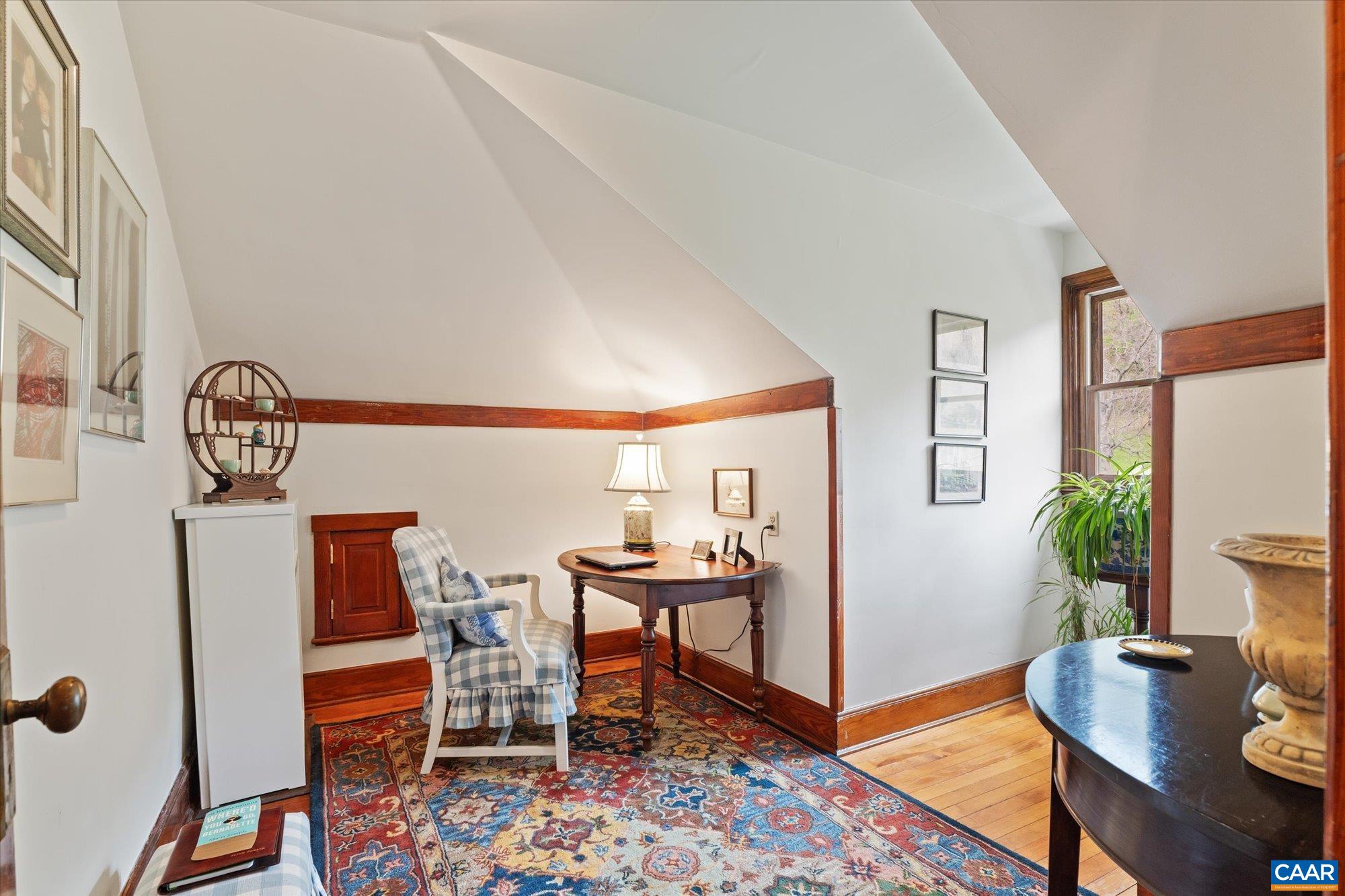 356 Routier Hill Road Hot Springs, VA 24445 - Photo 60 of 75 a view of a livingroom with furniture and a potted plant
