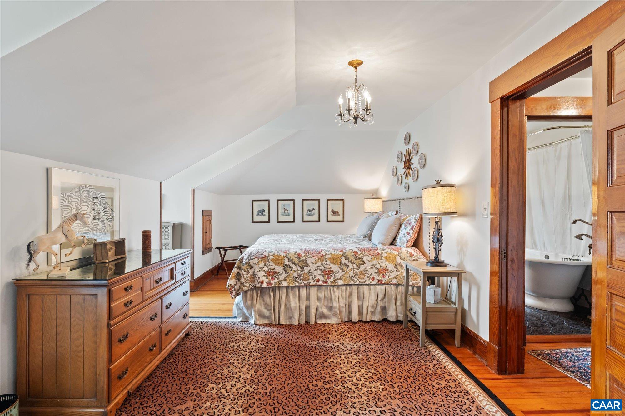 356 Routier Hill Road Hot Springs, VA 24445 - Photo 62 of 75 a bedroom with a bed and wooden floor