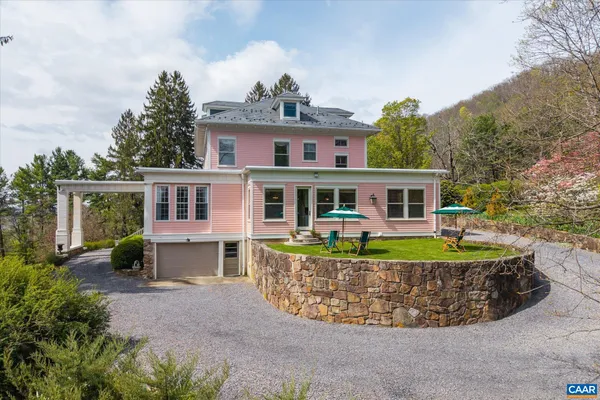 a view of a porch and garden