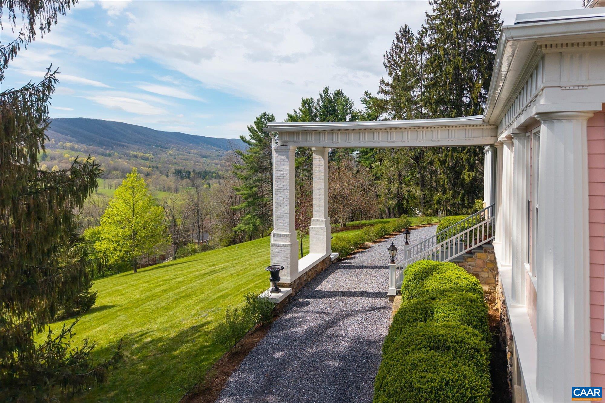 356 Routier Hill Road Hot Springs, VA 24445 - Photo 9 of 75 a view of a porch and garden