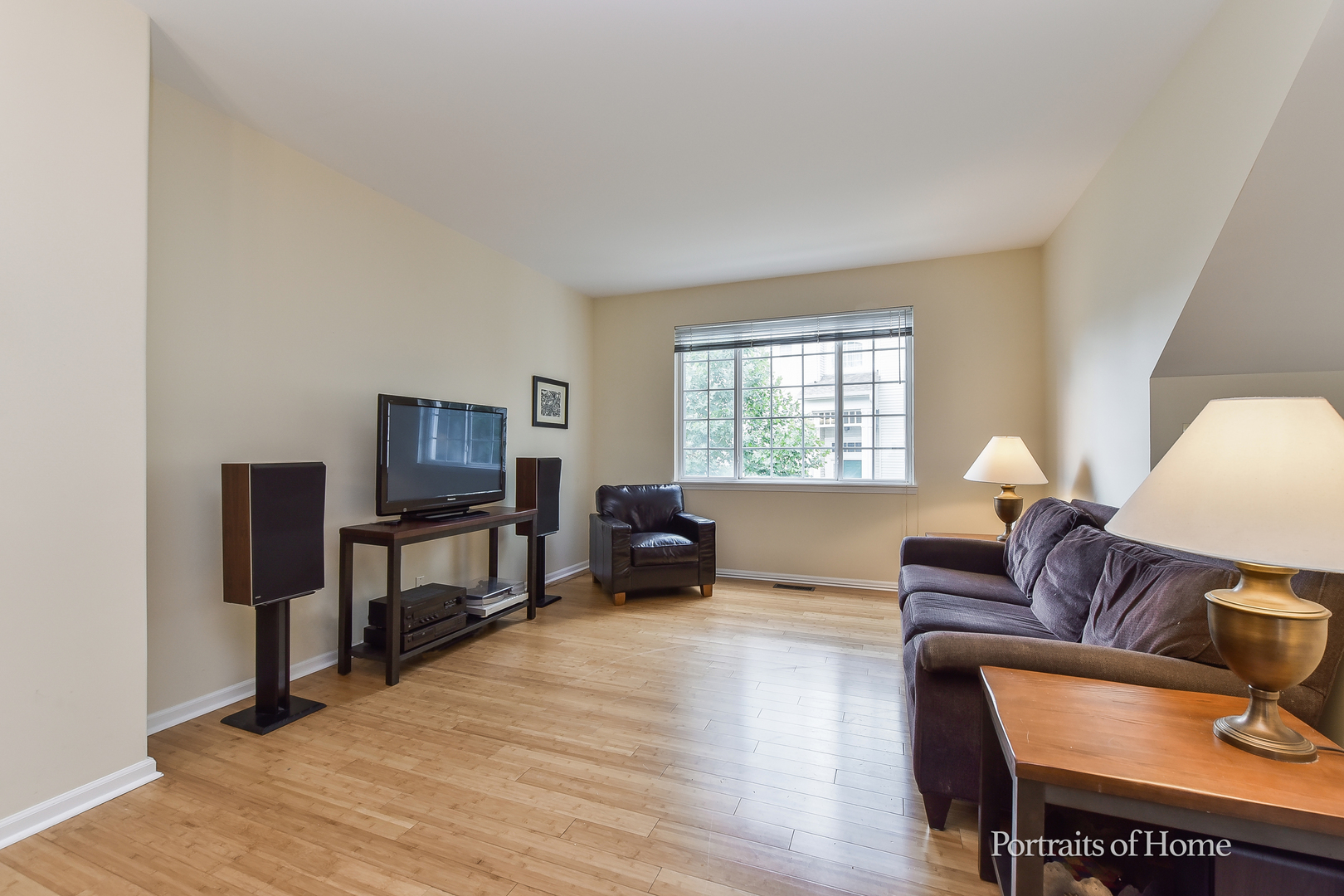 3464 Ravinia Circle Aurora, IL 60504 - Photo 3 of 22 a living room with furniture a window and a flat screen tv