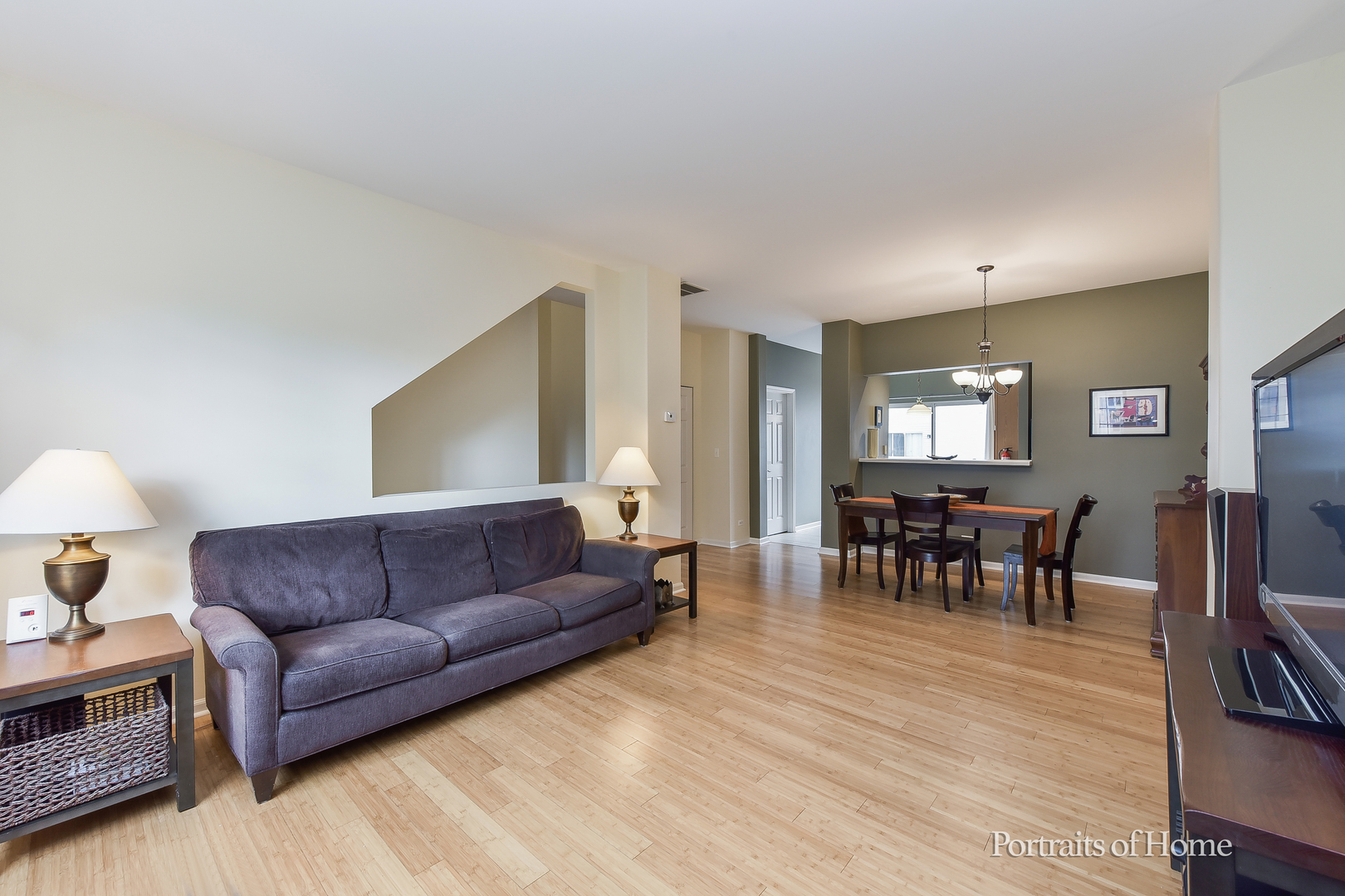 3464 Ravinia Circle Aurora, IL 60504 - Photo 4 of 22 a living room with furniture and wooden floor