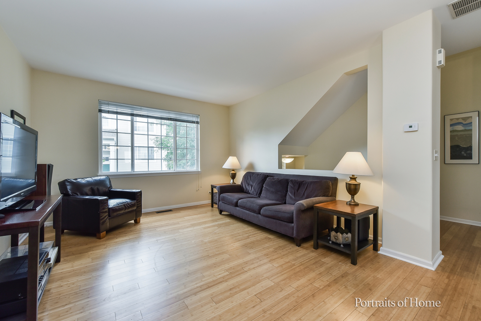 3464 Ravinia Circle Aurora, IL 60504 - Photo 5 of 22 a living room with furniture window and a wooden floor