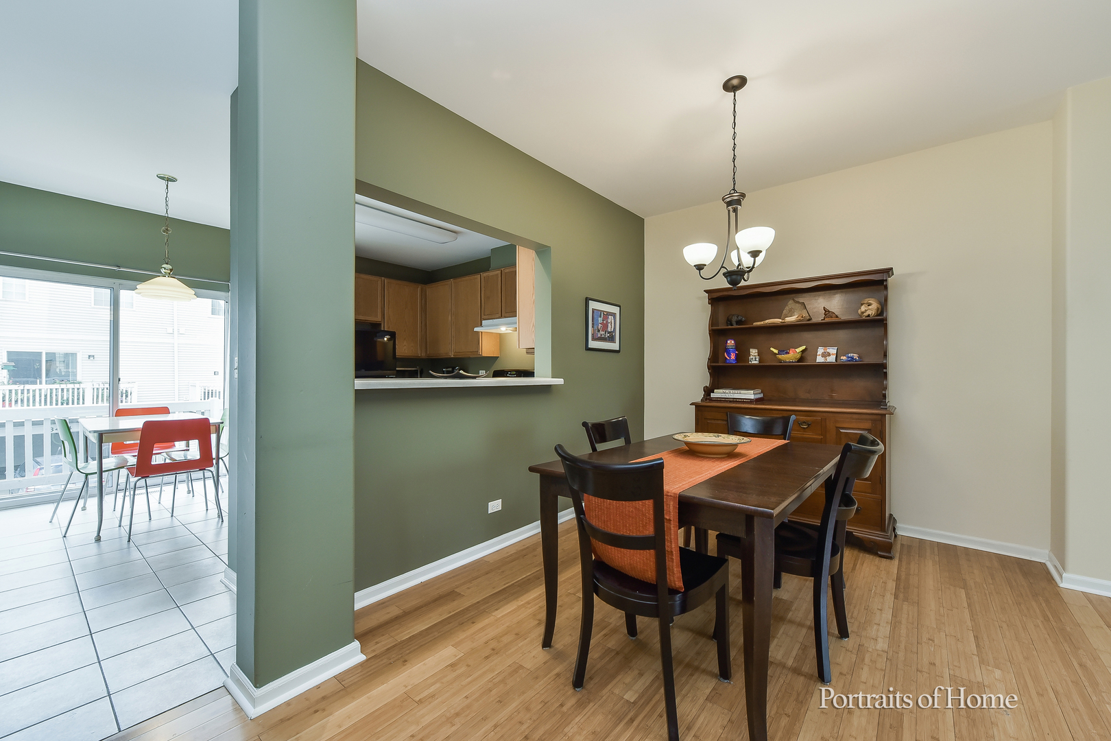 3464 Ravinia Circle Aurora, IL 60504 - Photo 7 of 22 a view of a dining room with furniture window and wooden floor