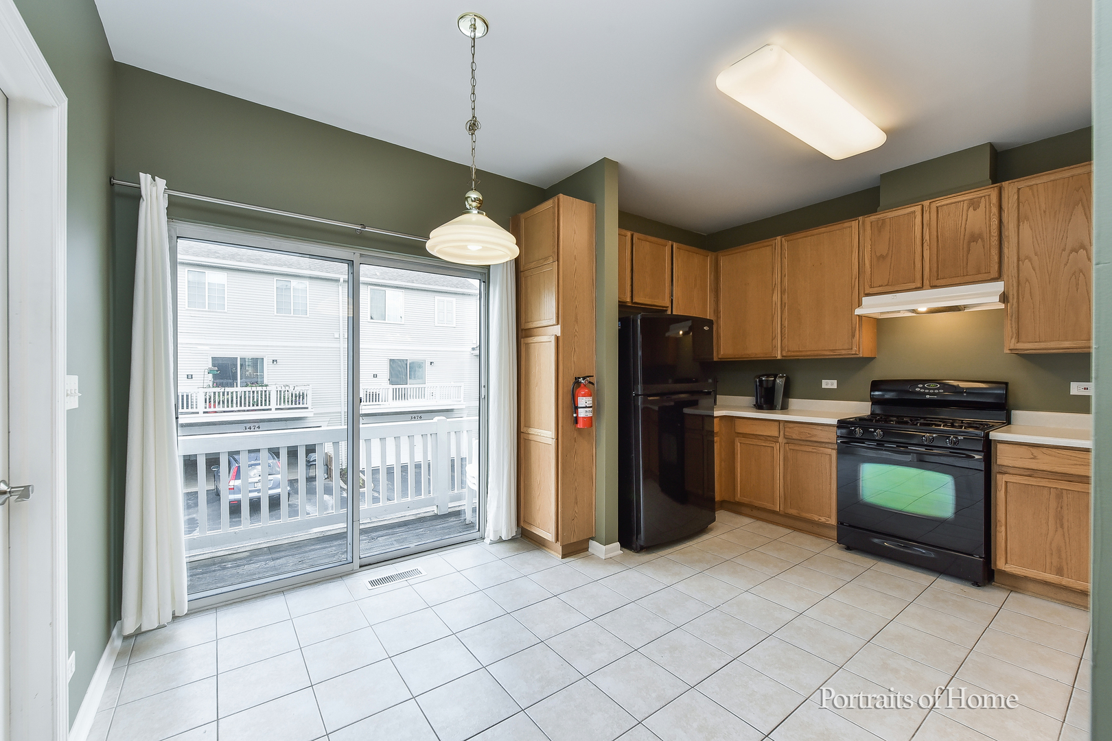3464 Ravinia Circle Aurora, IL 60504 - Photo 9 of 22 a kitchen with stainless steel appliances granite countertop a refrigerator a stove top oven a sink and dishwasher