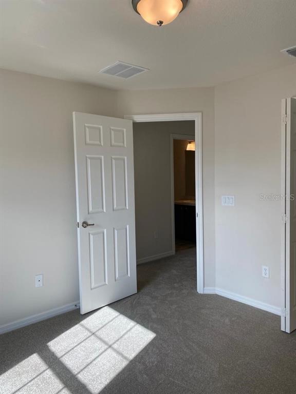 3331 Southwest 153rd Pl Road Ocala, FL 34473 - Photo 15 of 35 an empty room with closet