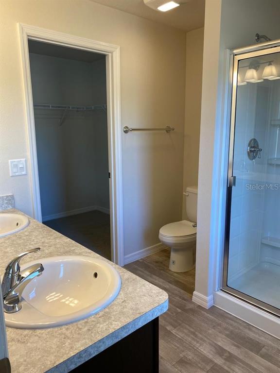 3331 Southwest 153rd Pl Road Ocala, FL 34473 - Photo 19 of 35 a bathroom with a sink and a mirror