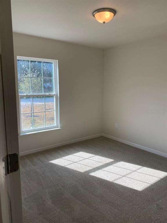 3331 Southwest 153rd Pl Road Ocala, FL 34473 - Photo 25 of 35 an empty room with a window