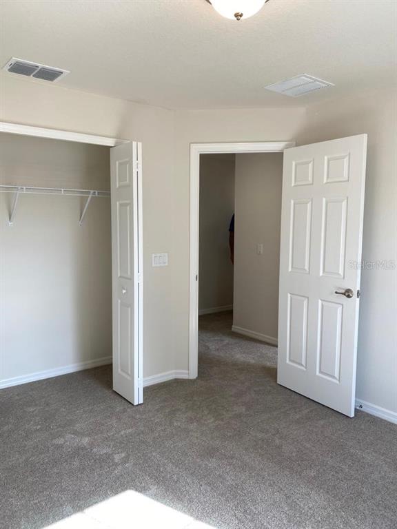 3331 Southwest 153rd Pl Road Ocala, FL 34473 - Photo 28 of 35 a view of an empty room with closet area