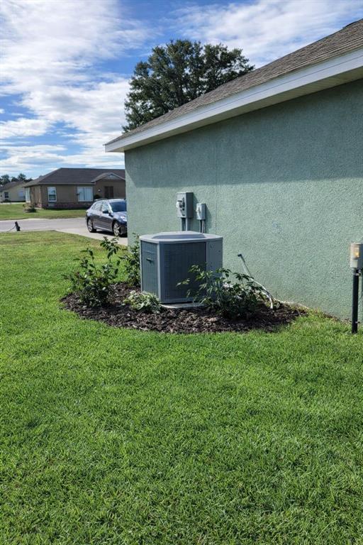 3331 Southwest 153rd Pl Road Ocala, FL 34473 - Photo 33 of 35 a view of a house with a back yard