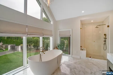 a living room with couch and a garden