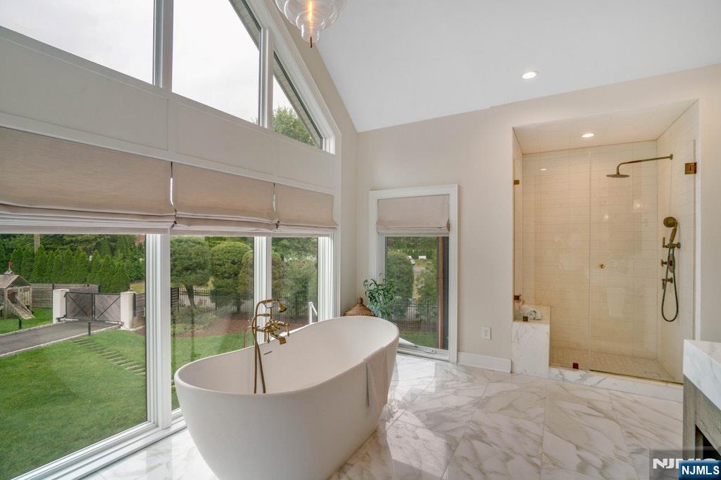 96 Bluff Road Fort Lee, NJ 07024 - Photo 15 of 22 a living room with couch and a garden