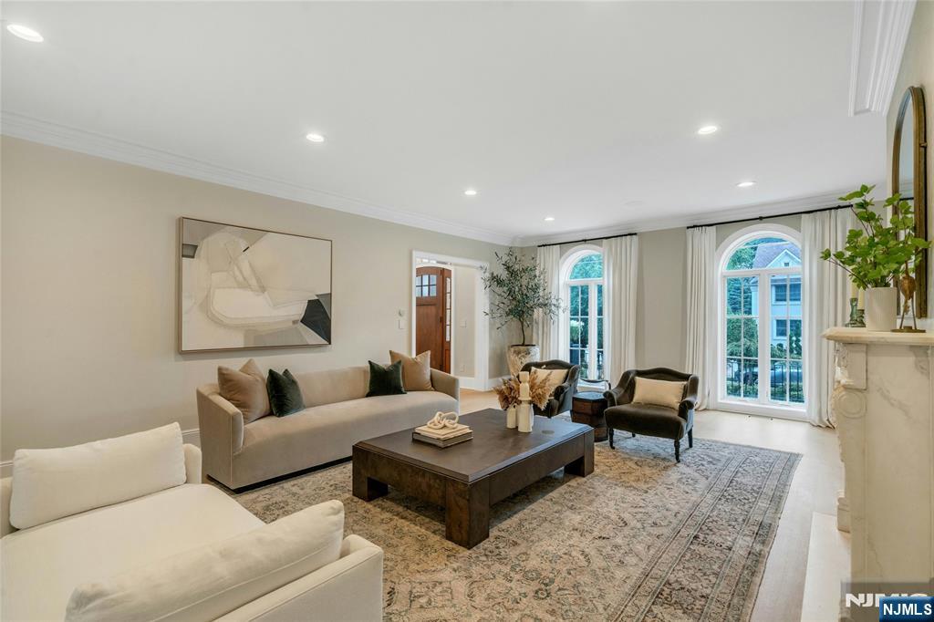 96 Bluff Road Fort Lee, NJ 07024 - Photo 7 of 22 a living room with furniture and a large window