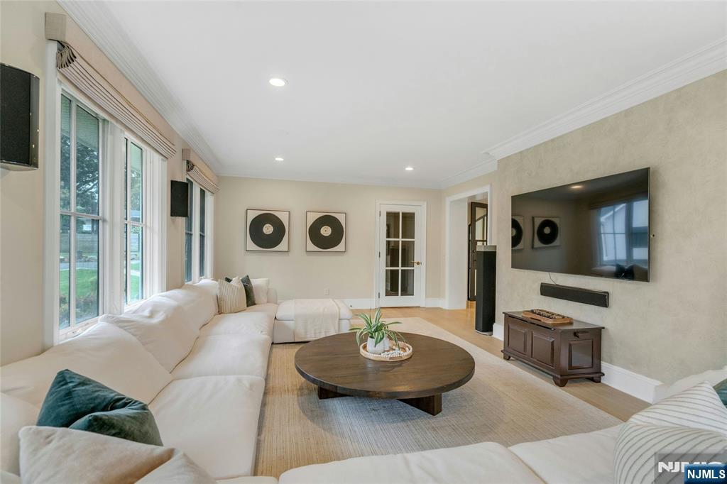 96 Bluff Road Fort Lee, NJ 07024 - Photo 8 of 22 a living room with furniture and a wooden floor