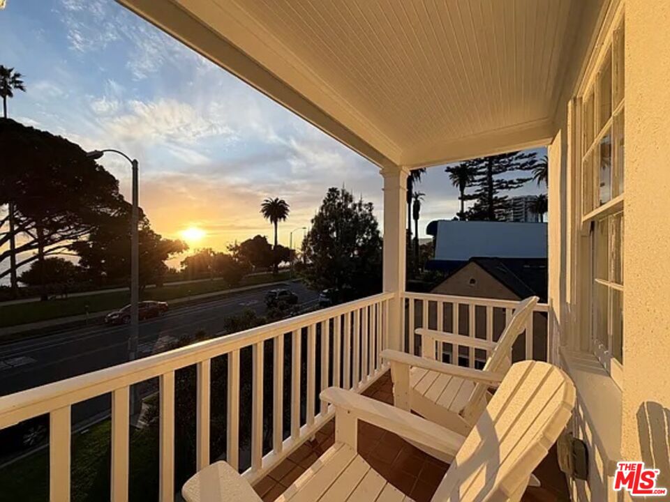 423 Ocean, Unit 2 Santa Monica, CA 90403 - Photo 5 of 18 a view of a two chairs and table on the balcony