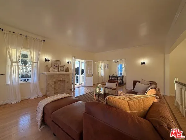 a bed room with a bed window and couch