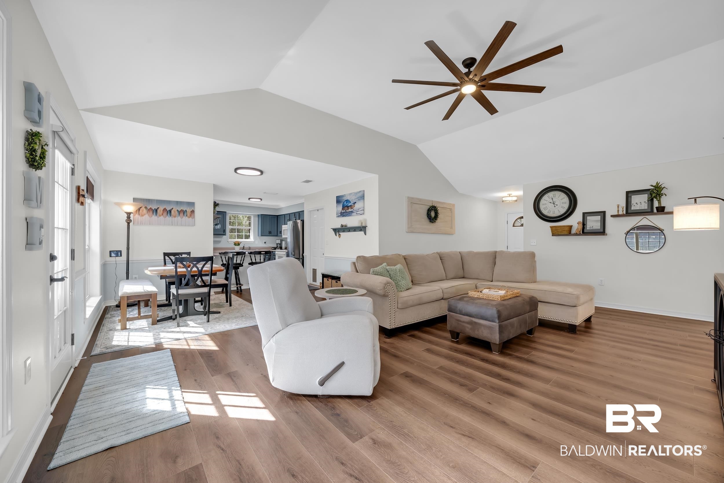 191 Robbins Boulevard Daphne, AL 36526 - Photo 5 of 24 Living area with light wood finished floors and a ceiling fan