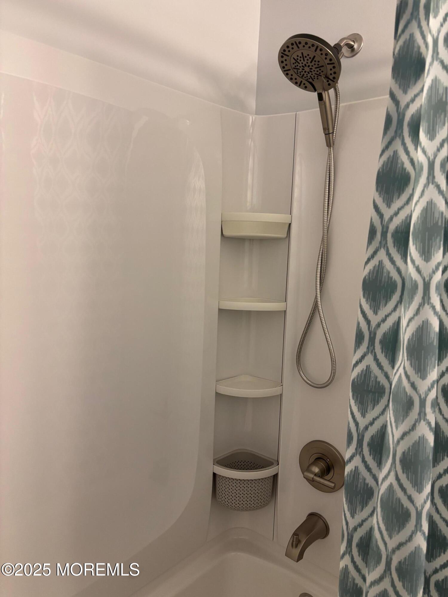 169 Manor Drive Red Bank, NJ 07701 - Photo 8 of 15 a view of a rack on the wall