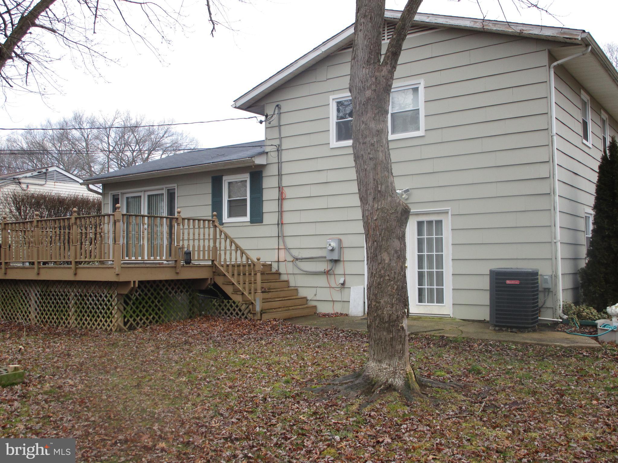 810 Ferguson Road Joppa, MD 21085 - Photo 21 of 22 Rear with deck off of eat in kitchen