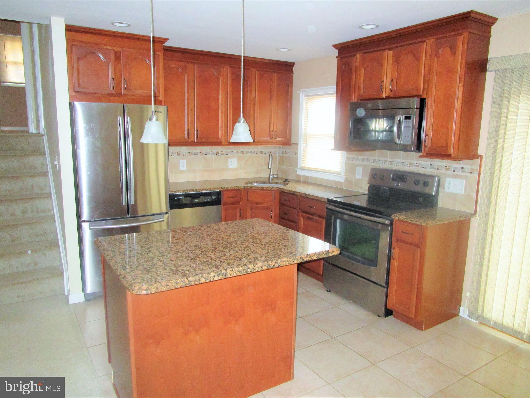 810 Ferguson Road Joppa, MD 21085 - Photo 9 of 22 Kitchen with stainless steel appliances