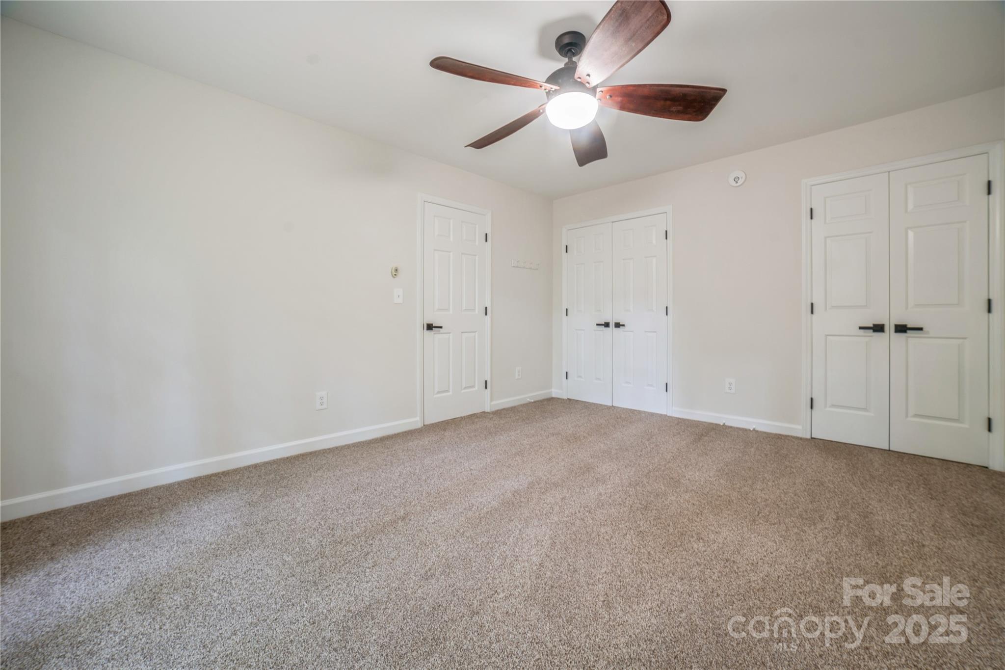 26056 Neptunes Landing Fort Mill, SC 29708 - Photo 24 of 47 an empty room with chandelier fan