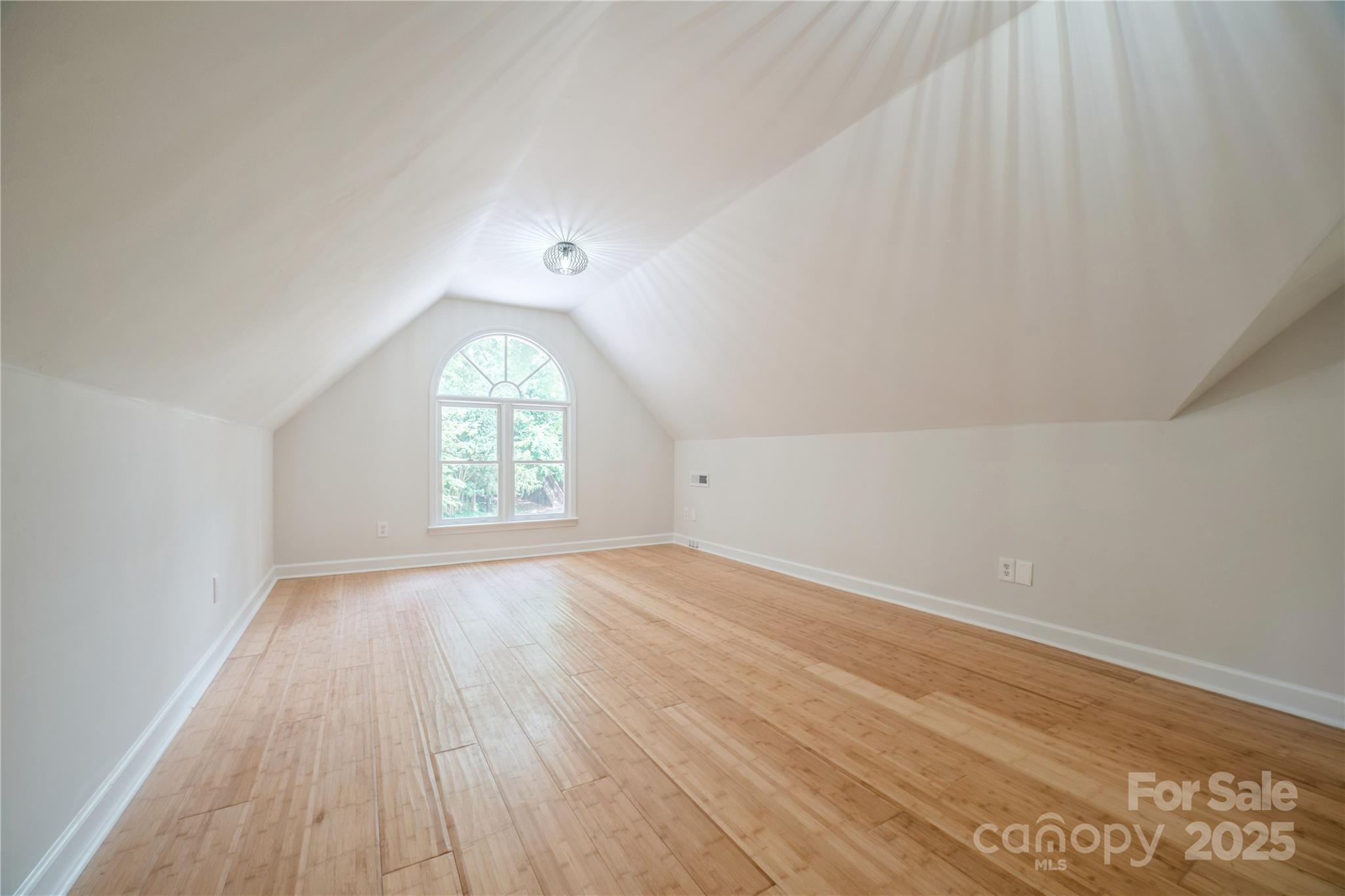 26056 Neptunes Landing Fort Mill, SC 29708 - Photo 31 of 47 wooden floor in an empty room with a window