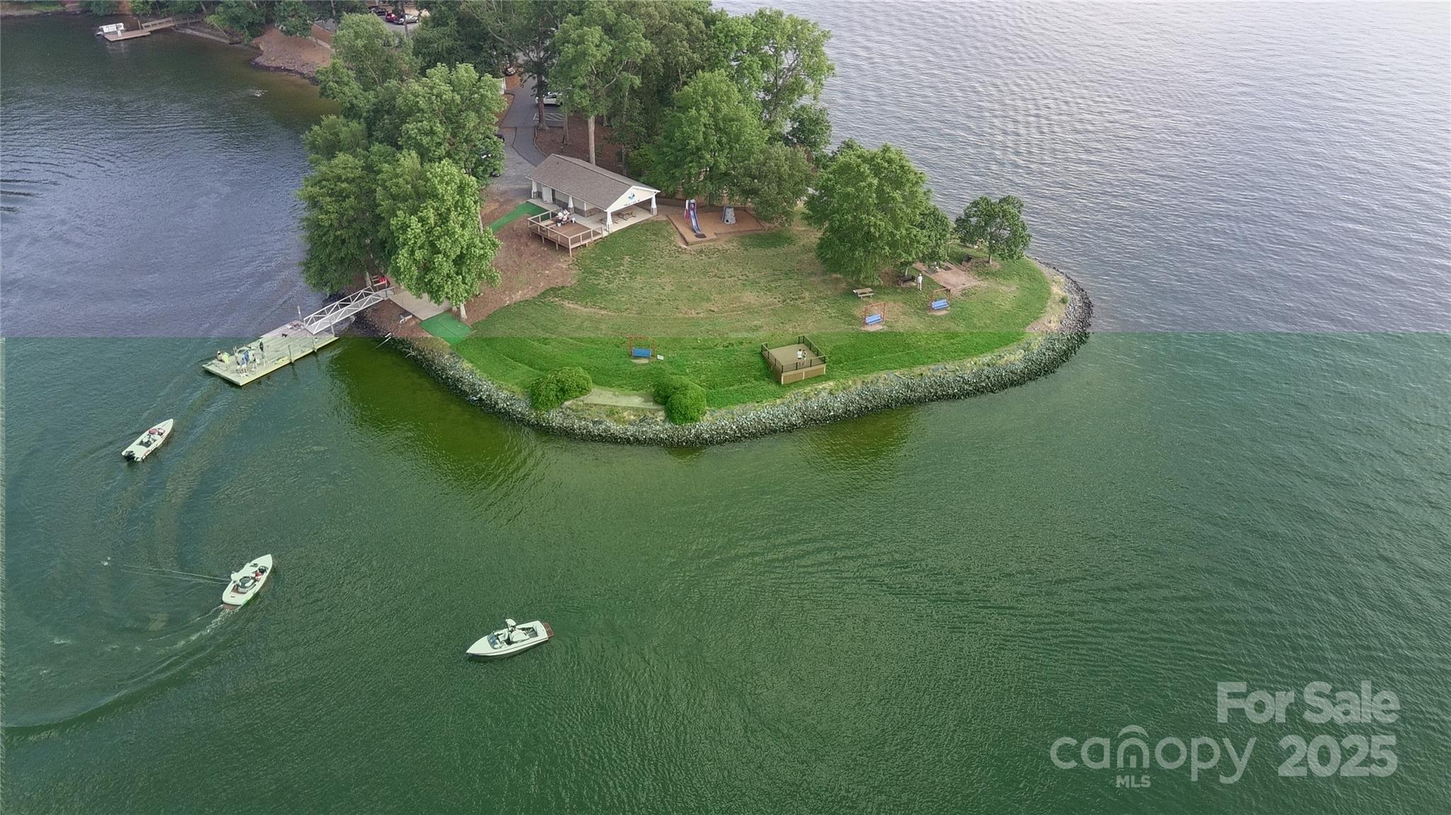 26056 Neptunes Landing Fort Mill, SC 29708 - Photo 36 of 47 a view of a golf course with a garden