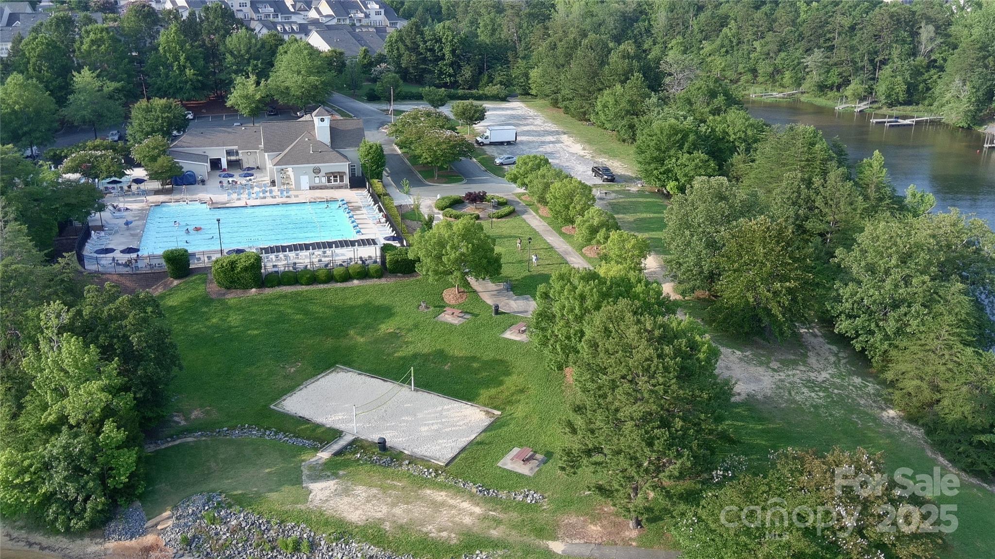 26056 Neptunes Landing Fort Mill, SC 29708 - Photo 39 of 47 a view of a house with a yard and lake