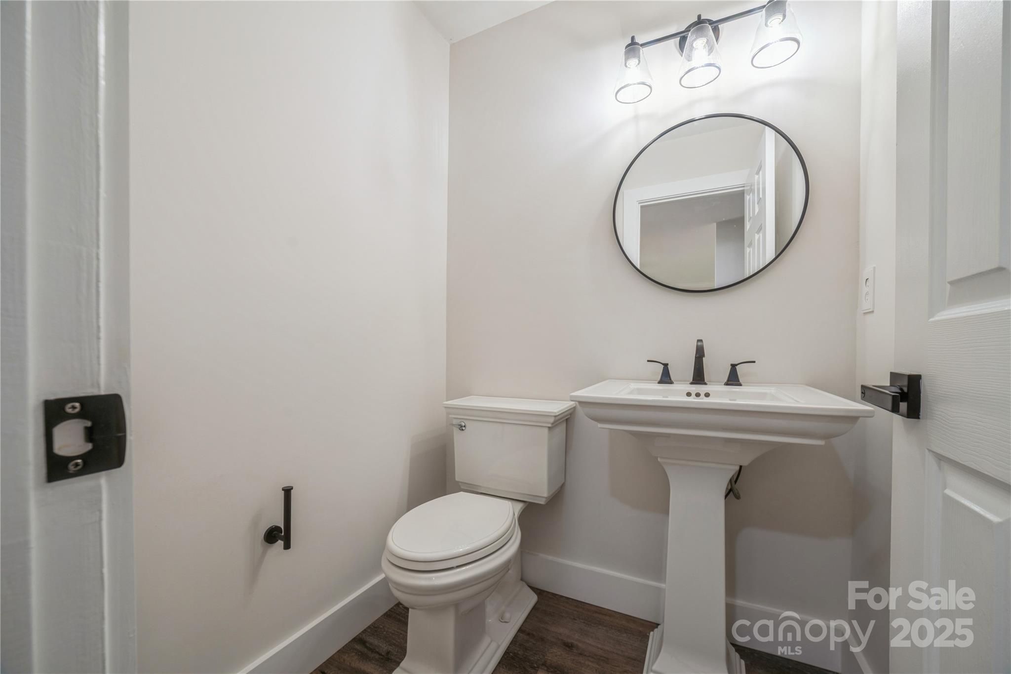 26056 Neptunes Landing Fort Mill, SC 29708 - Photo 10 of 47 a bathroom with a sink and a toilet