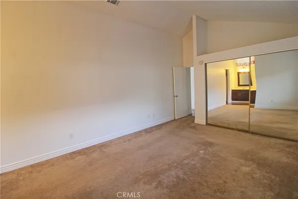 an empty room with sliding door