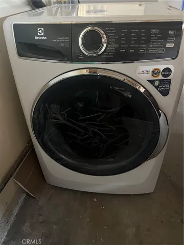 a utility room with a washer and dryer