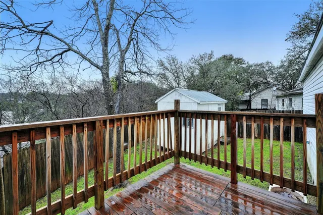 a view of a wooden roof deck