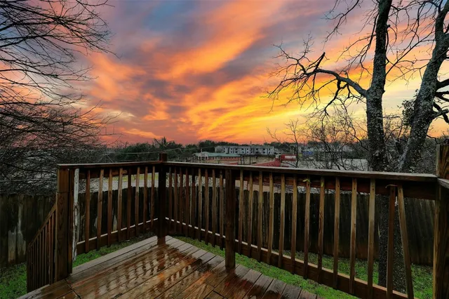a view of a wooden fence