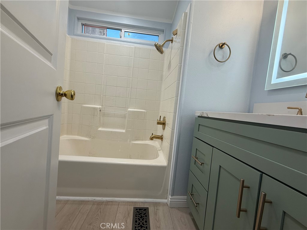 716 North Grand, Unit D3 Covina, CA 91724 - Photo 18 of 35 a bathroom with a bathtub and a shower